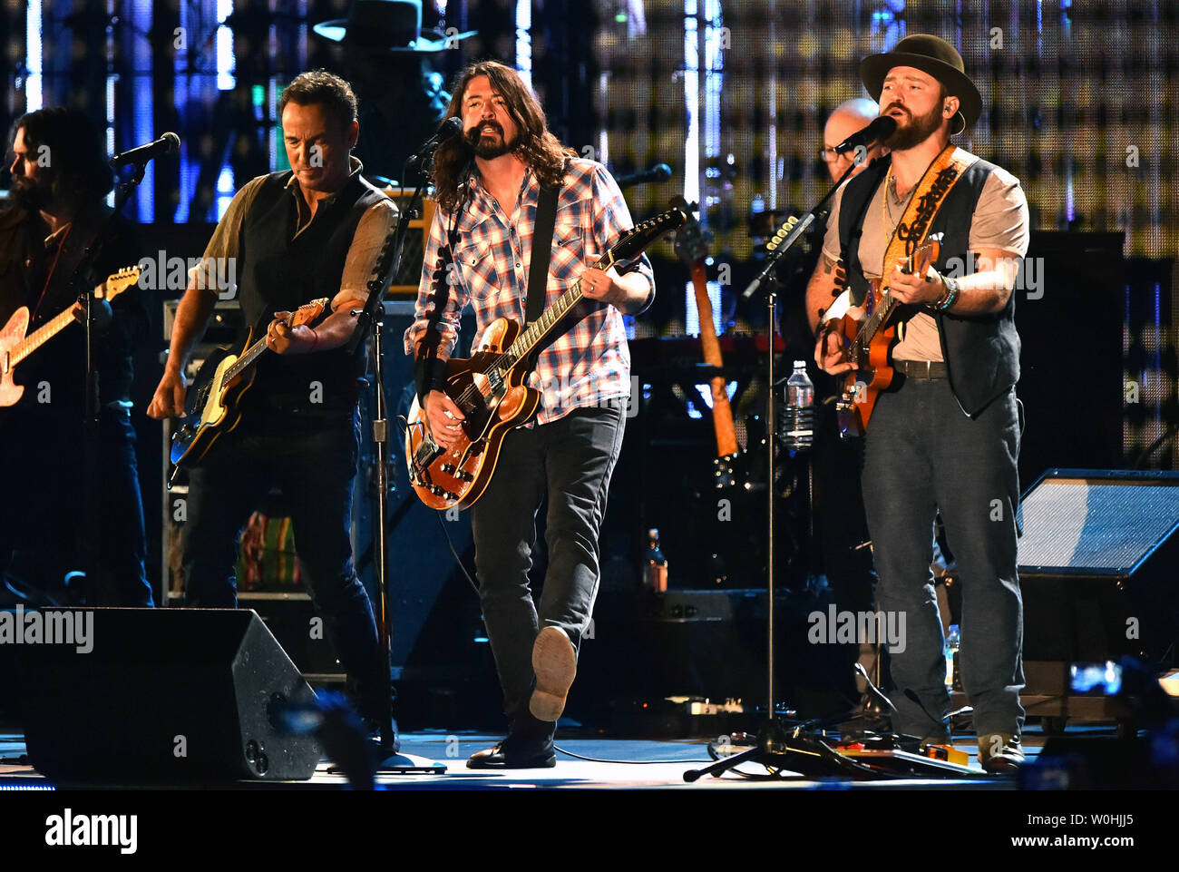 Bruce Springsteen (left), David Grohl (center) and Zac Brown, of the