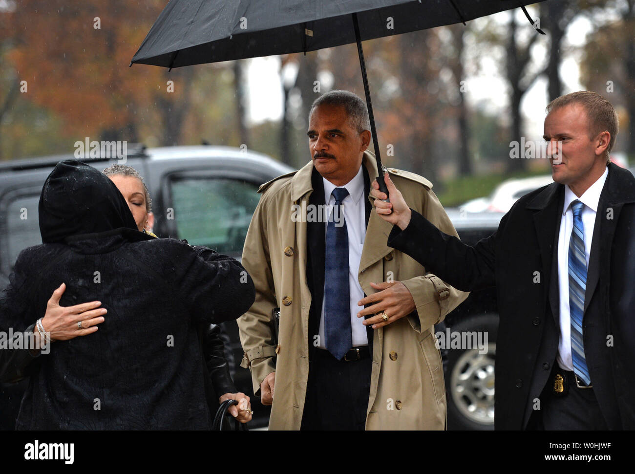 Attorney Genaral Eric Holder arrives for a memorial tree planting for Emmett Till, on the ground of the U.S. Capitol in Washington, D.C. on November 17, 2014.  Till, was a young African-American man whose brutal killing in 1955 raised public awareness that led to important civil rights reforms in our nation. UPI/Kevin Dietsch Stock Photo