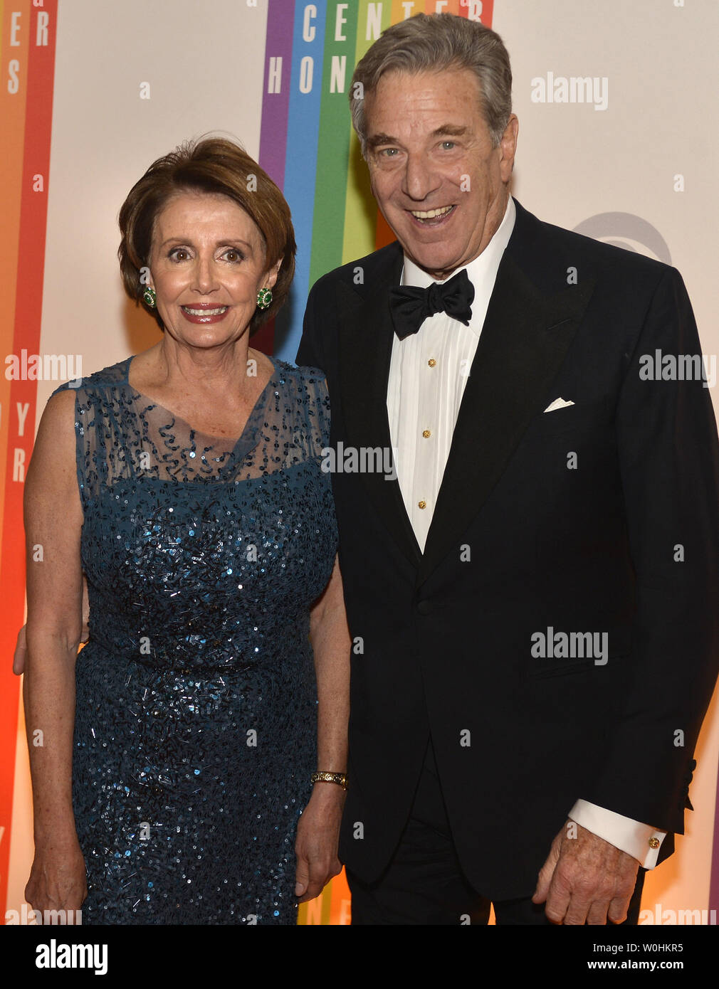 U S House Minority Leader Nancy Pelosi D Ca And Her Husband Paul Pose For Photographers On The Red Carpet As They Arrive For An Evening Of Gala Entertainment At The Kennedy Center December
