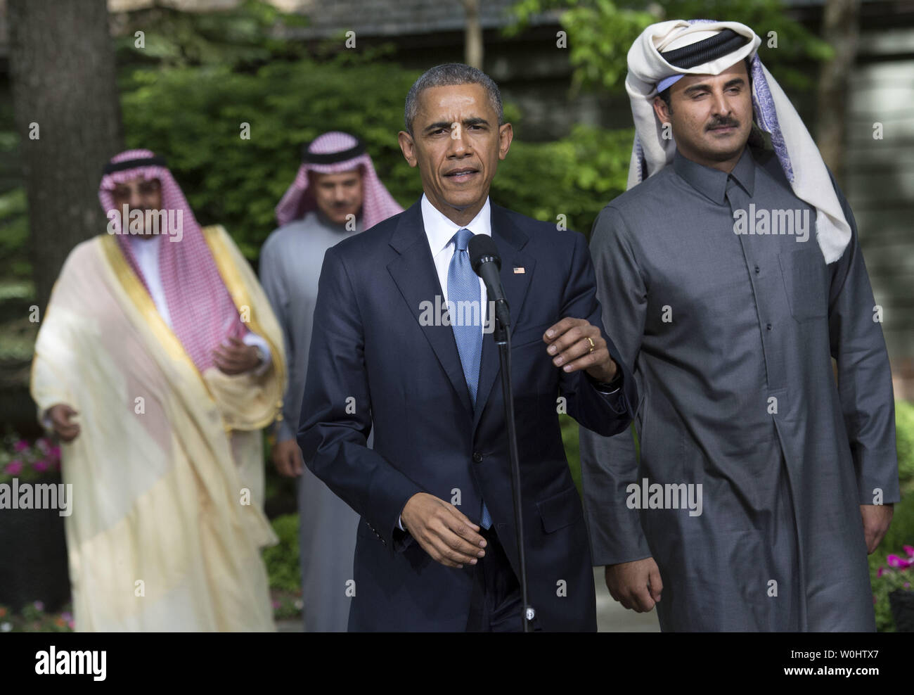 President Barack Obama delivers remarks alongside Qatar's Emir Sheikh Tamim  bin Hamad Al-Thani, following the Gulf Cooperation Council-U.S. summit at  Camp David on May 14, 2015. Obama hosted leaders from Saudi Arabia,