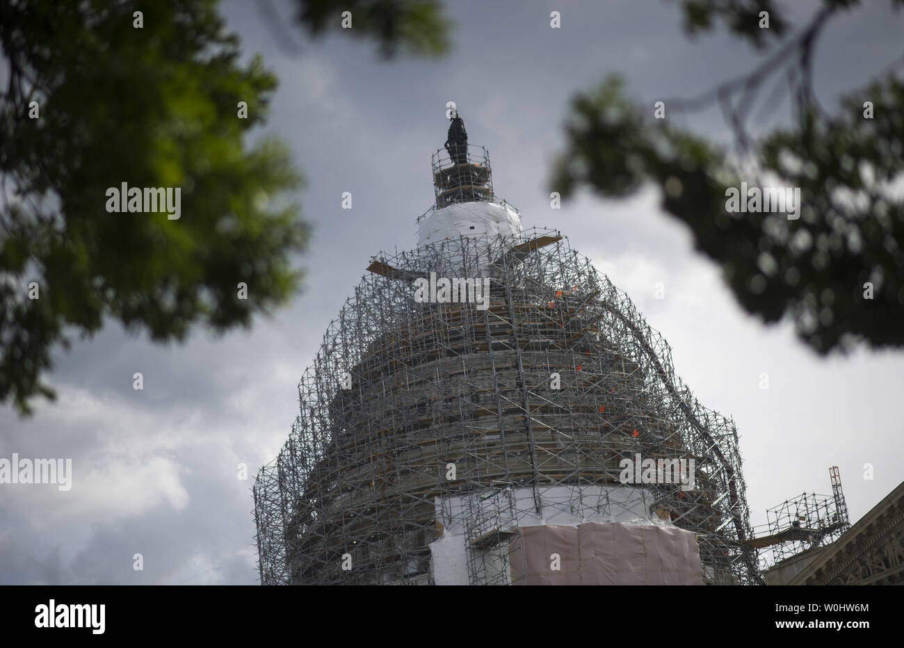 The U.S. Capitol Building is seen prior to a Senate vote on the U.S.A. Freedom Act during a rare Sunday session on Capitol Hill in Washington, D.C. on May 31, 2015. Three intelligence tools are set to expire later today with the Patriot Act, including the NSA's bulk collection of Americans' phone records. Lawmakers are debating the House's U.S.A Freedom Act which will renew certain intelligence tools. Photo by Kevin Dietsch/UPI. Stock Photo