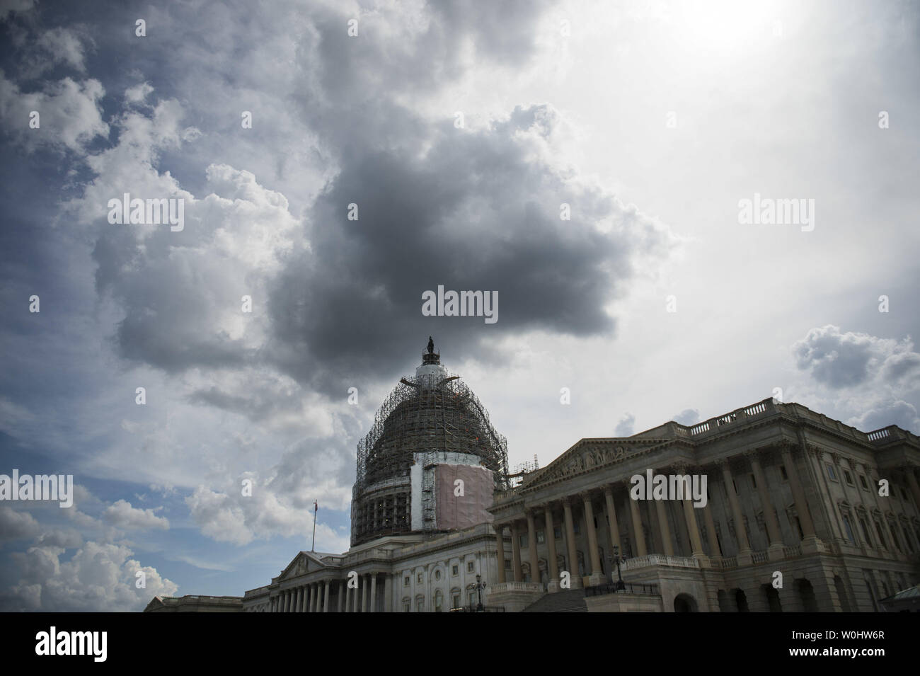 The U.S. Capitol Building is seen prior to a Senate vote on the U.S.A. Freedom Act during a rare Sunday session on Capitol Hill in Washington, D.C. on May 31, 2015. Three intelligence tools are set to expire later today with the Patriot Act, including the NSA's bulk collection of Americans' phone records. Lawmakers are debating the House's U.S.A Freedom Act which will renew certain intelligence tools. Photo by Kevin Dietsch/UPI. Stock Photo
