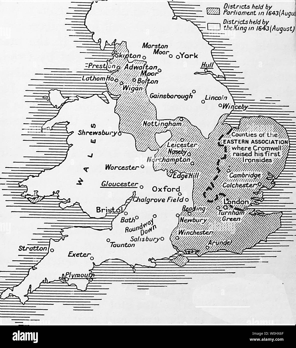 A 1930's schoolbook map showing English cities (underlined) that were loyal to the king in the English Civil War  and areas held by him or by Cromwell's Parliament  1643 - 1643 was the second year of the First English Civil War Stock Photo