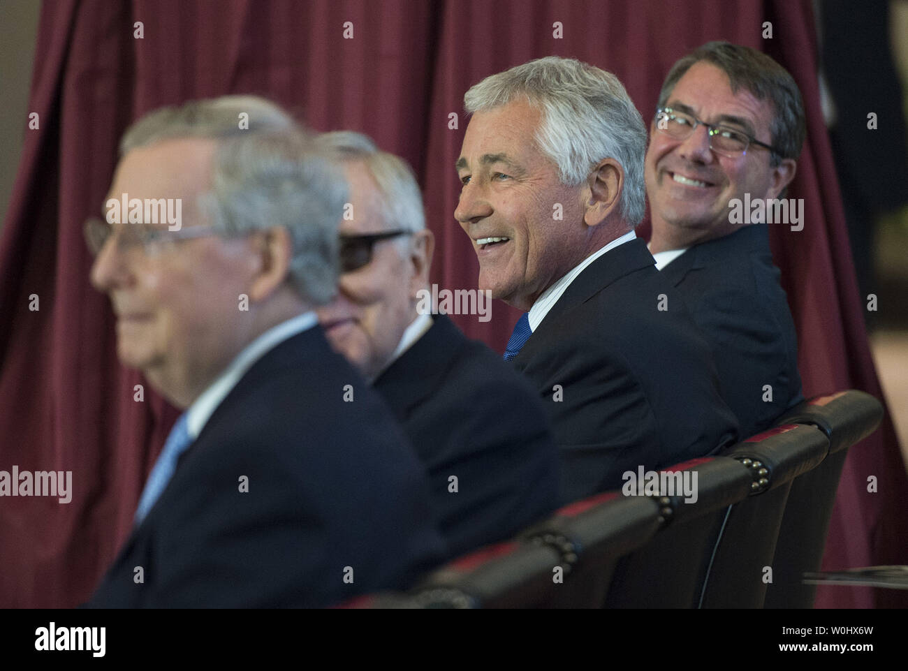 From right to left, Defense Secretary Ashton Carter, former Defense Secretary Chuck Hagel, Senate Minority Leader Harry Reid, D-NV and Senate Majority Leader  Mitch McConnell, R-KY, attend the Congressional Commemoration Ceremony in honor of the 50th anniversary of the Vietnam War, on Capitol Hill in Washington, D.C. on July 8, 2015.  Photo by Kevin Dietsch/UPI Stock Photo