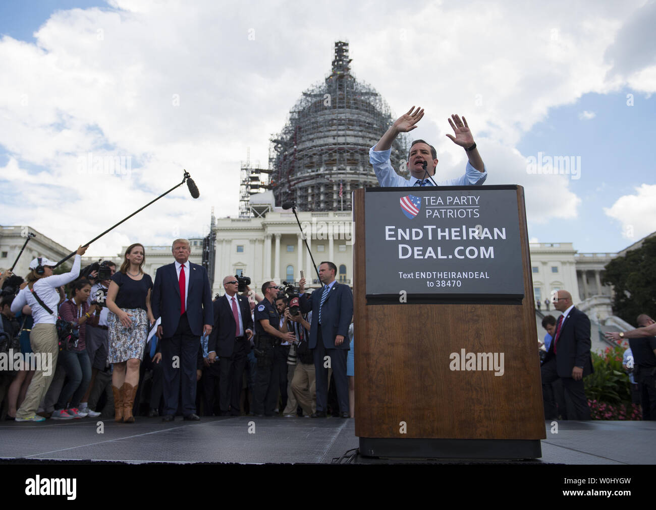 Republican presidential candidate Sen. Ted Cruz (R-TX) speaks while Republican Candidate Donald Trump waits to speak at the Tea Party Patriots' Rally Against the Iran Deal in front of the U.S. Capitol in Washington DC, September 9, 2015.  Photo by Molly Riley/UPI Stock Photo