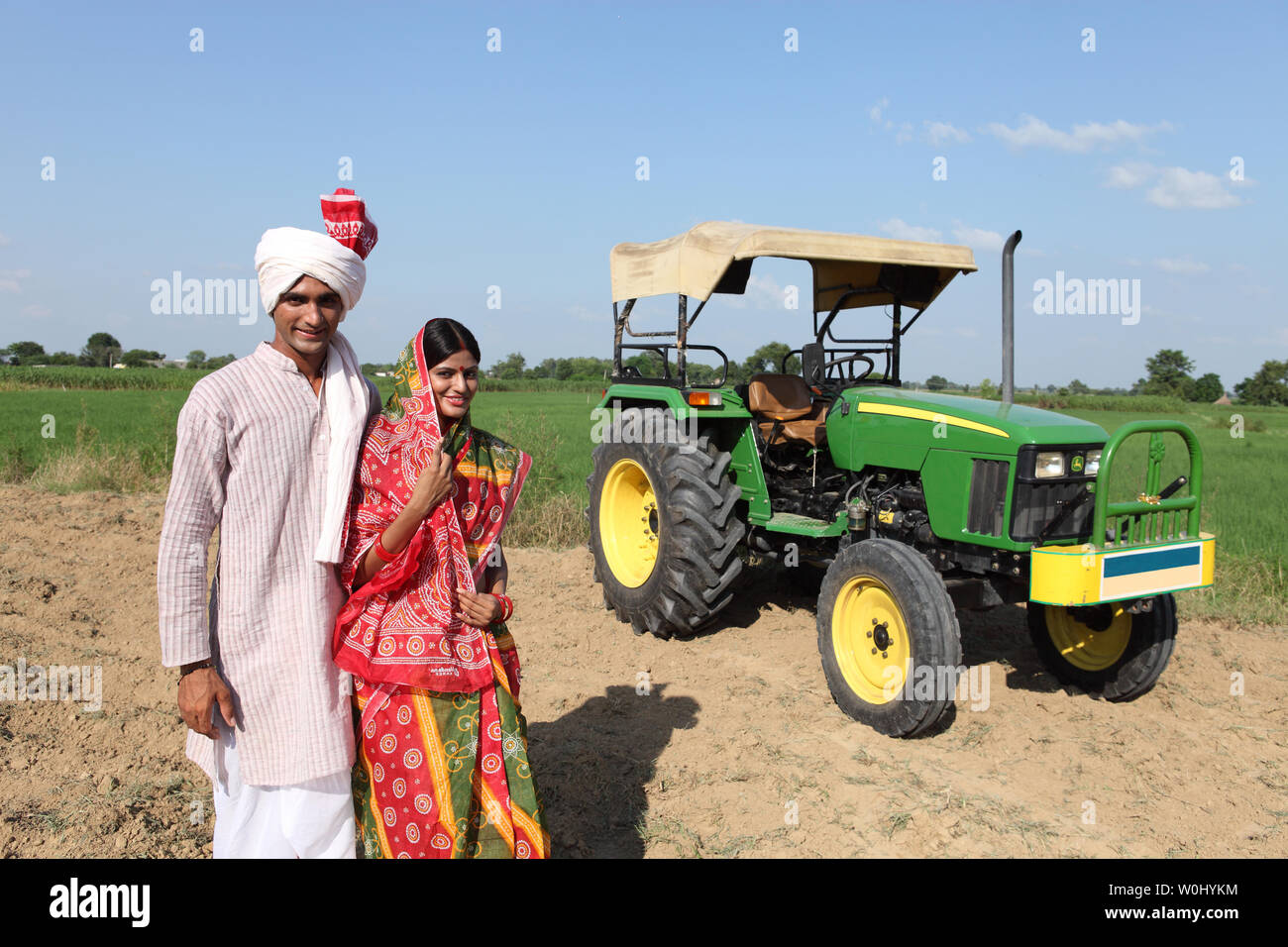 Portrait of an Indian farmer standing with his wife in a field Stock ...