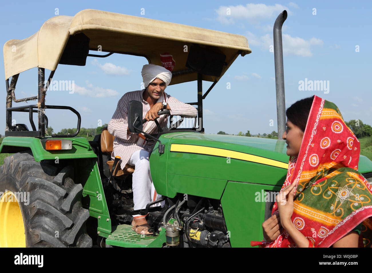 Farmer with his wife in a field Stock Photo - Alamy