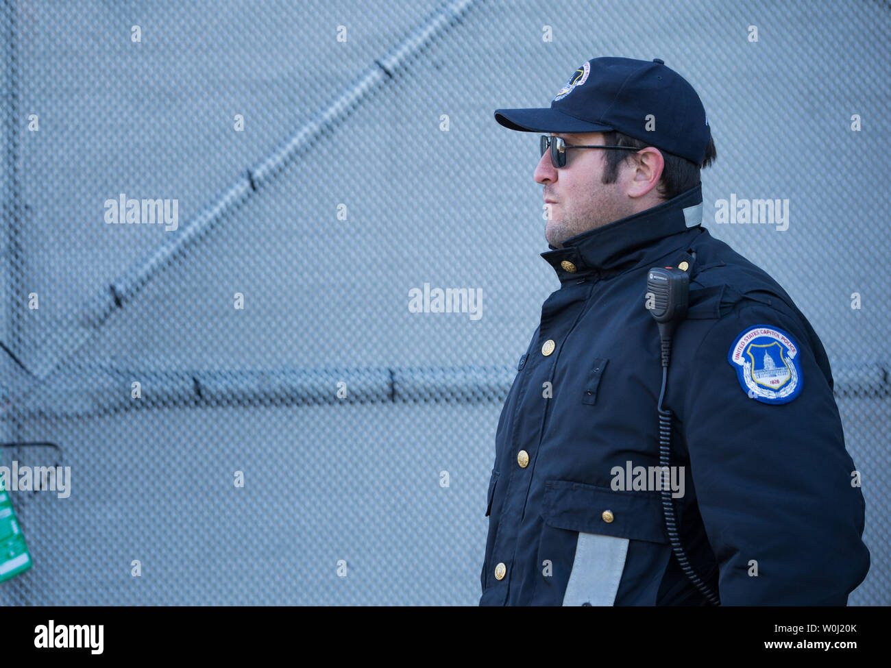 A Capitol Police Officer stands guard outside the U.S. Capitol in ...