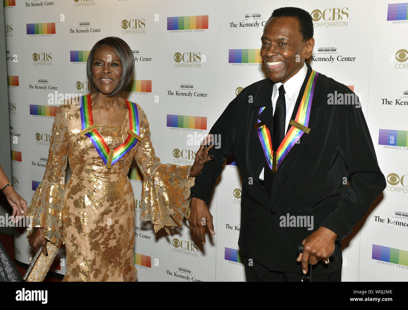 2015 Kennedy Center Honoree actress and Broadway star Cicely Tyson (L) and dancer Arthur Mitchell pose for photographers on the red carpet as they arrive for an evening of gala entertainment at the Kennedy Center, December 6, 2015, in Washington, DC.  The Honors are bestowed annually on five artists for their lifetime achievement in the arts and culture.    UPI/Mike Theiler Stock Photo
