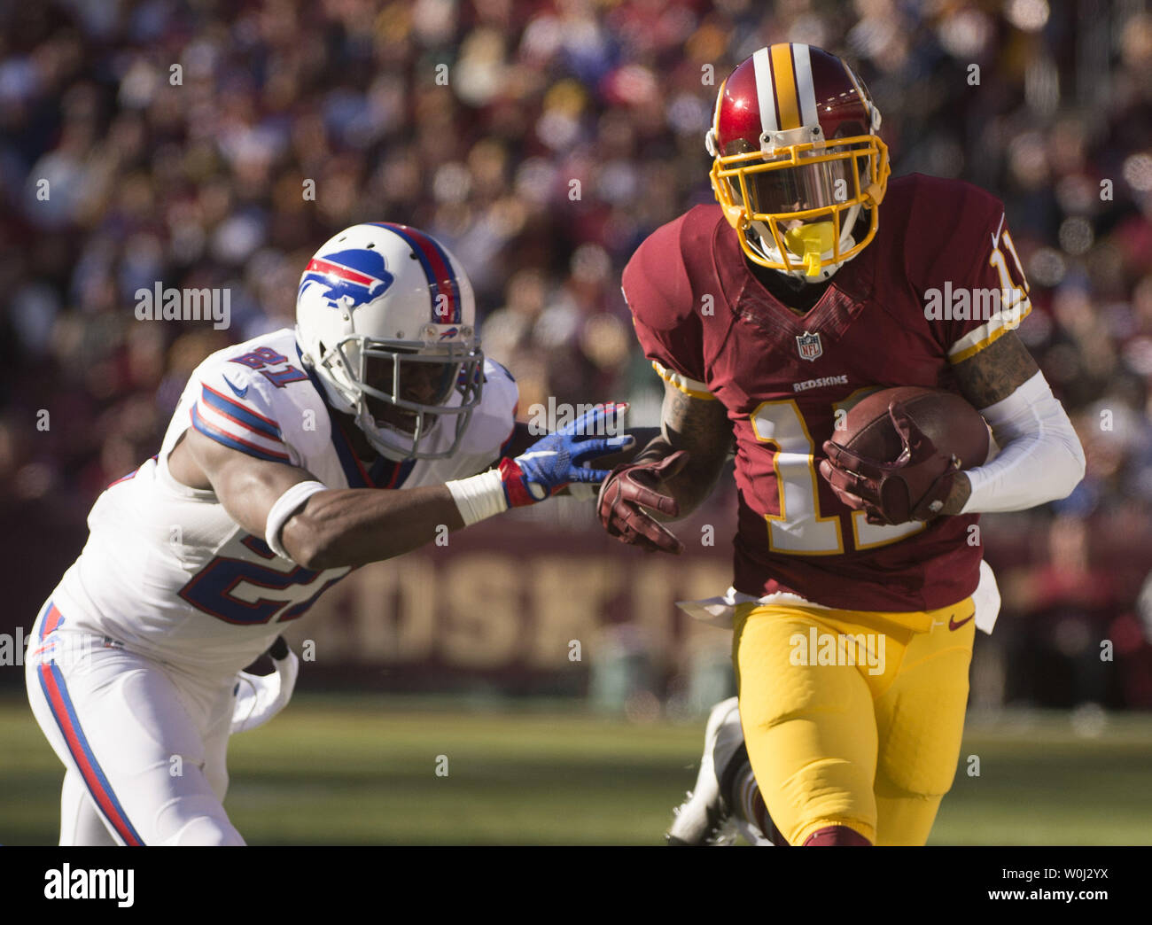Washington Redskins wide receiver DeSean Jackson (11) brings in a 7-yard gain against Buffalo Bills strong safety Leodis McKelvin (21) in the first quarter at FedEx Field in Landover, Maryland on December 20, 2015. Photo by Kevin Dietsch/UPI Stock Photo