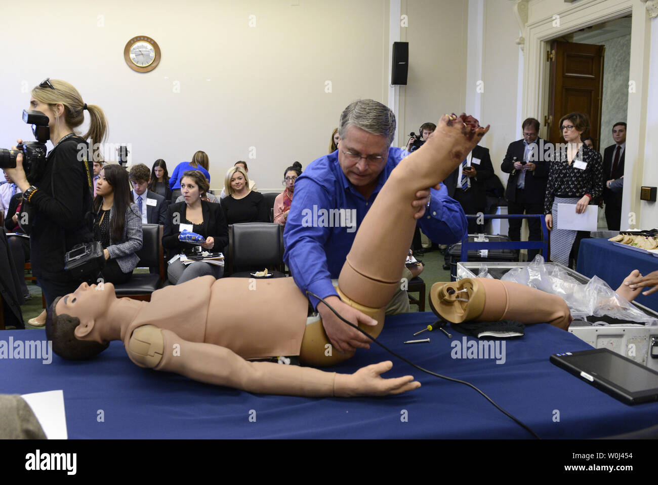 A technician from Canadian Aviation Engineering (CAE) Health Care assembles a human simulator for a demonstration on using simulators instead of animals in teaching battlefield trauma to medical personnel, during a briefing, February 10, 2016, on Capitol Hill,  in Washington, DC. A bill is before Congress proposing cost savings by using the technology and sparing animals, which is supported by People for the Ethical Treatment of Animals (PETA).     Photo by Mike Theiler/UPI Stock Photo