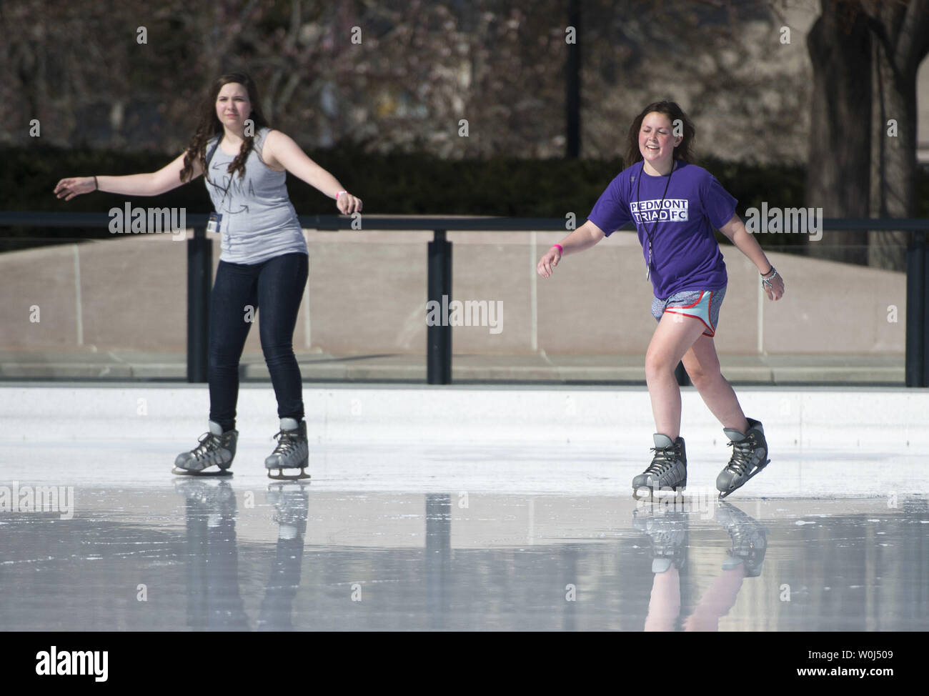 People Ice Skate As Temperatures Climb Into The Mid 70 S At The