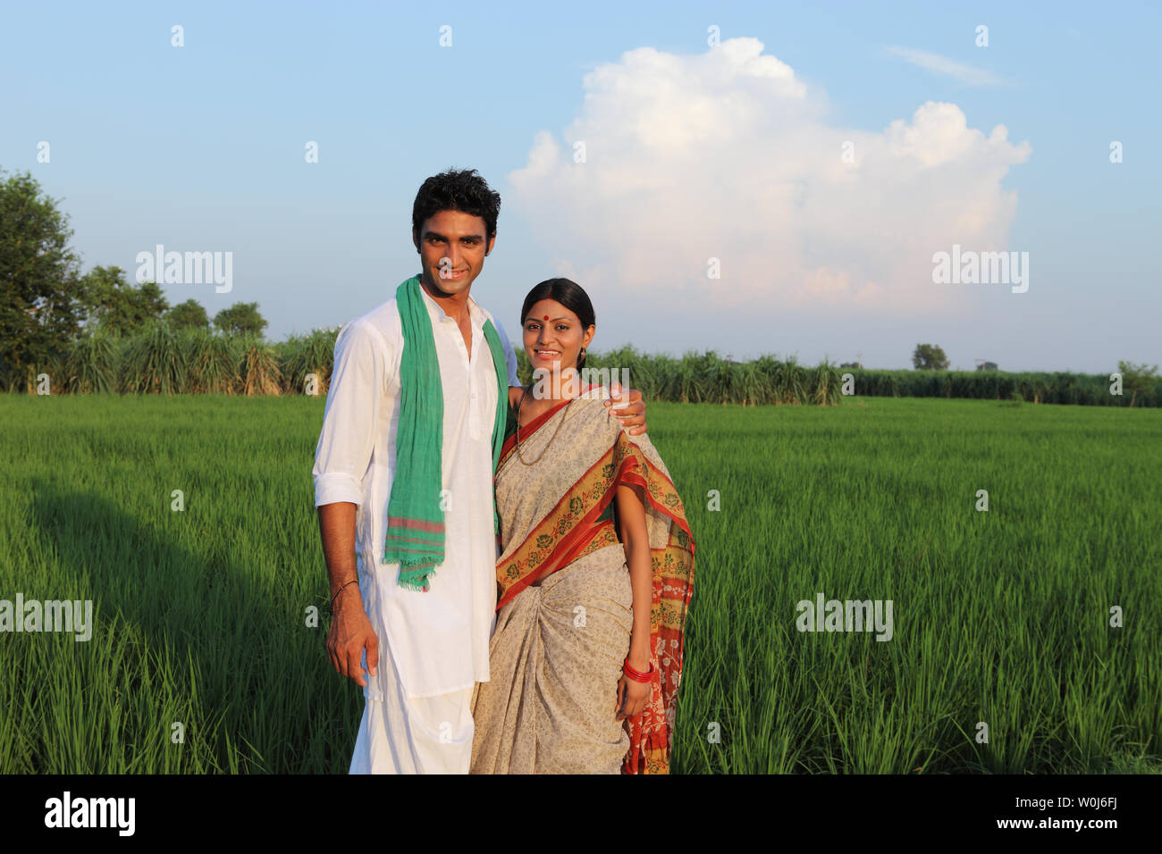 Indian farmer wife standing in hi-res stock photography and images - Alamy