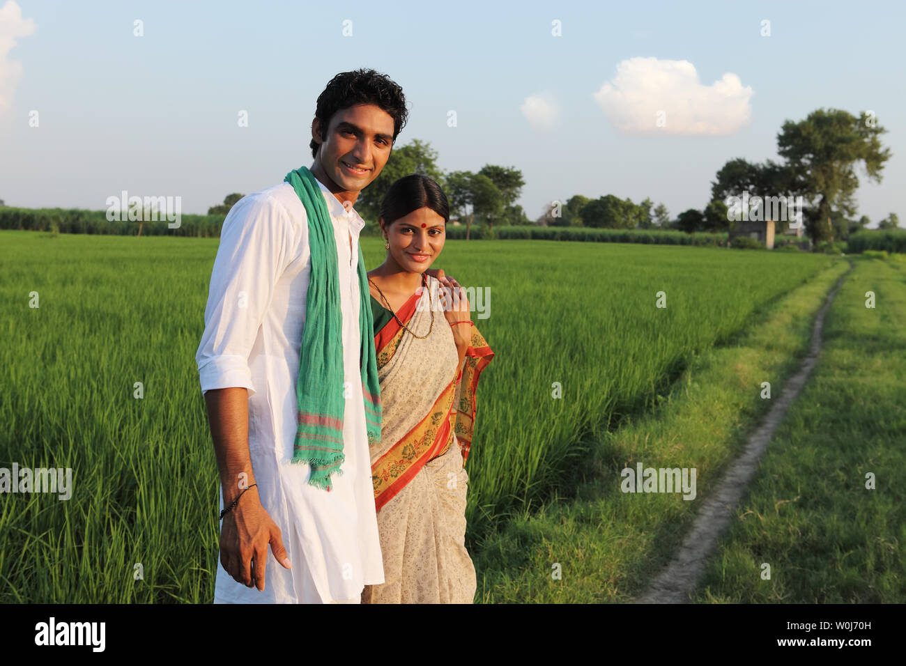 Indian farmer wife standing in hi-res stock photography and images - Alamy