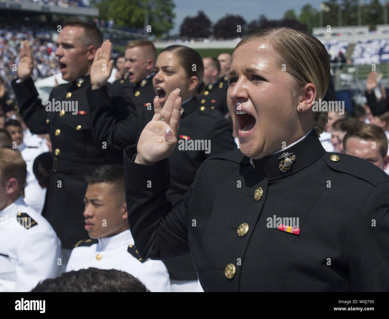 Midshipman Michaela Connally takes the Oath of Office during the 2016