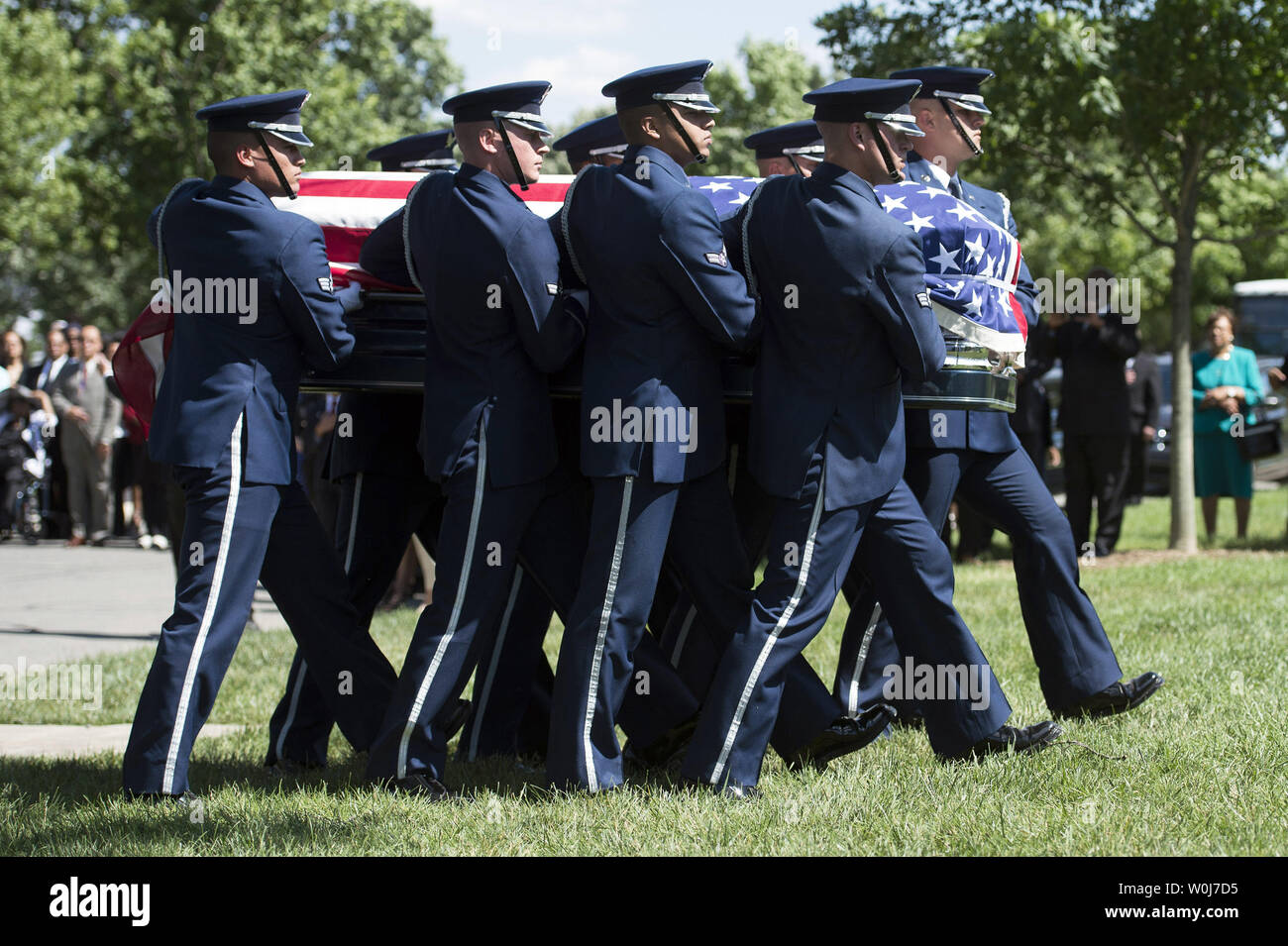 An Air Force Honor Guard casket team carries the casket containing the remains of U.S. Air Force 2nd Lt., Malvin Greston 'Mal' Whitfield during his funeral at Arlington National Cemetery in Arlington, Virginia on June 8, 2016. Whitfield served in the U.S. Army Air Forces in 1943 as a member of the Tuskegee Airmen and was also a five-time Olympic medalist, including three gold. Photo by Kevin Dietsch/UPI Stock Photo