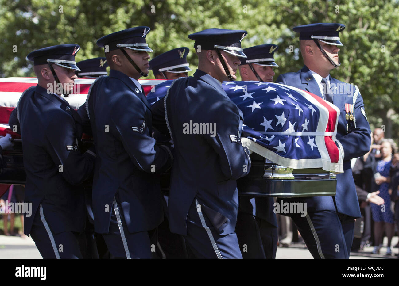 An Air Force Honor Guard casket team carries the casket containing the remains of U.S. Air Force 2nd Lt., Malvin Greston 'Mal' Whitfield during his funeral at Arlington National Cemetery in Arlington, Virginia on June 8, 2016. Whitfield served in the U.S. Army Air Forces in 1943 as a member of the Tuskegee Airmen and was also a five-time Olympic medalist, including three gold. Photo by Kevin Dietsch/UPI Stock Photo