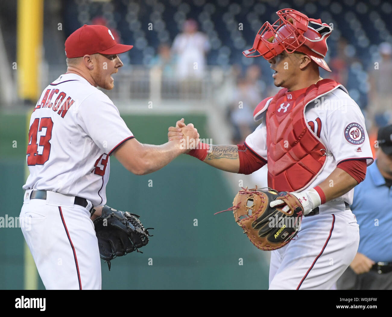 Washington Nationals Mark Melanin celebrates with Wilson Ramos after the Nationals defeated the Mets 1-0 at Nationals Park in Washington, D.C. on September 14, 2106. Photo by Kevin Dietsch/UPI Stock Photo