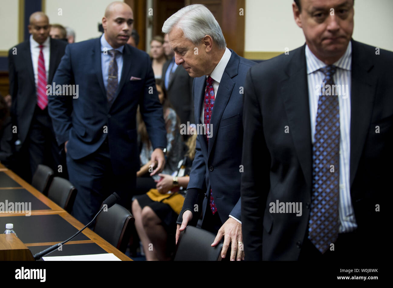 John Stumpf, chairman and CEO of Wells Fargo & Company, arrives to ...