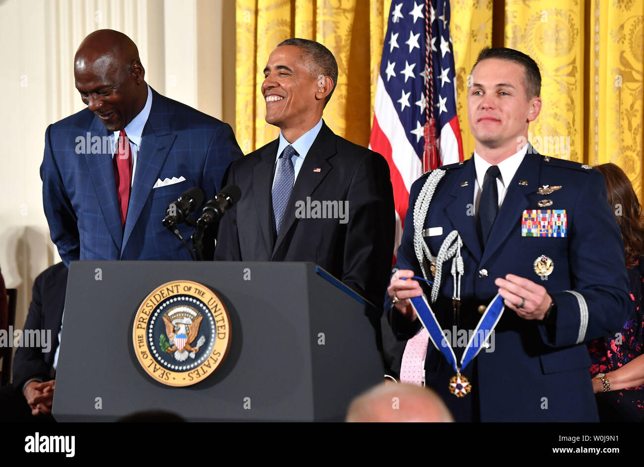 President Barack Obama awards the Presidential Medal of Freedom to  basketball legend Michael Jordan, during a ceremony at the White House in  Washington, D.C. on November 22, 2016. Obama awarded 21 medals