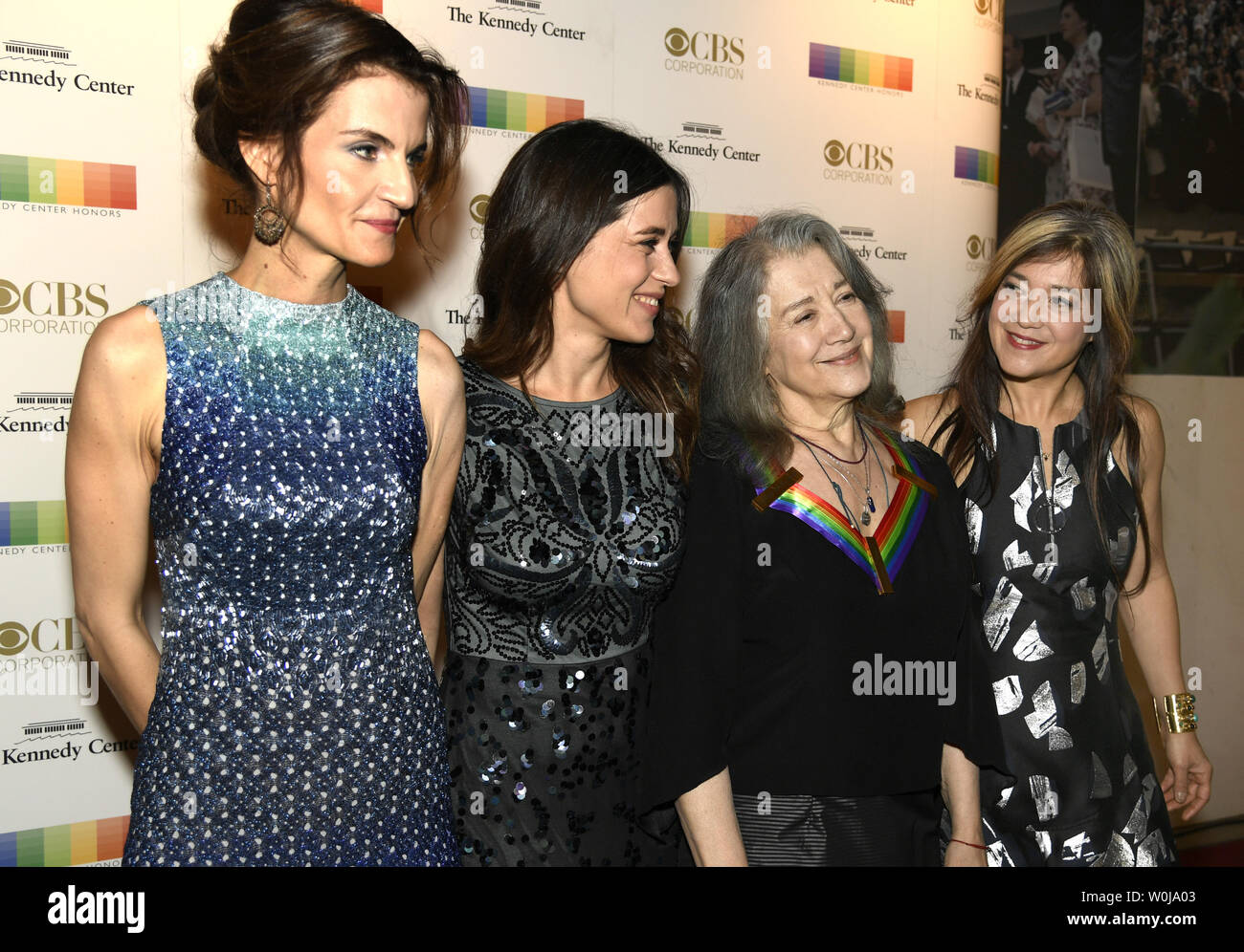 2016 Kennedy Center Honoree Argentine-born pianist Martha Argerich (2nd,R) poses for photographers with her daughters (L-R) Anne Catherine Dutoit, Stephanie Argerich and Lyda Chen on the red carpet as they arrive for an evening of gala entertainment at the Kennedy Center, December 4, 2016, in Washington, DC.  The Honors are bestowed annually on five artists for their lifetime achievement in the arts and culture.    Photo by Mike Theiler/UPI Stock Photo