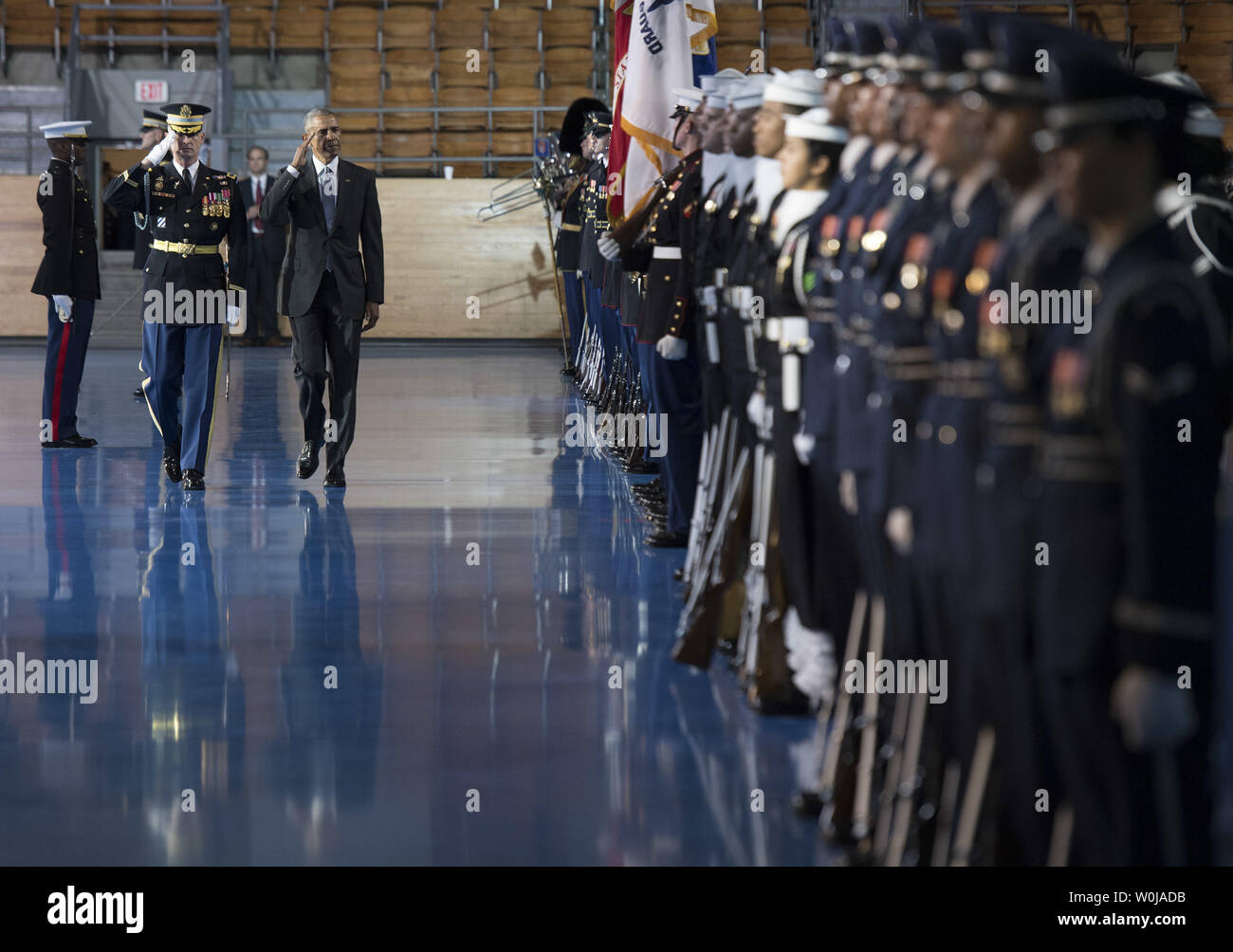 President Barack Obama is escorted by Army Col. Jason T Garkey as he inspects the Armed Forces Honor Guard during his Armed Forces Full Honor Review Farewell Ceremony at Joint Base Myers-Henderson Hall, in Virginia on January 4, 2017. The five braces of the military honored the president and vice-president for their service as they conclude their final term in office. Photo by Kevin Dietsch/UPI Stock Photo