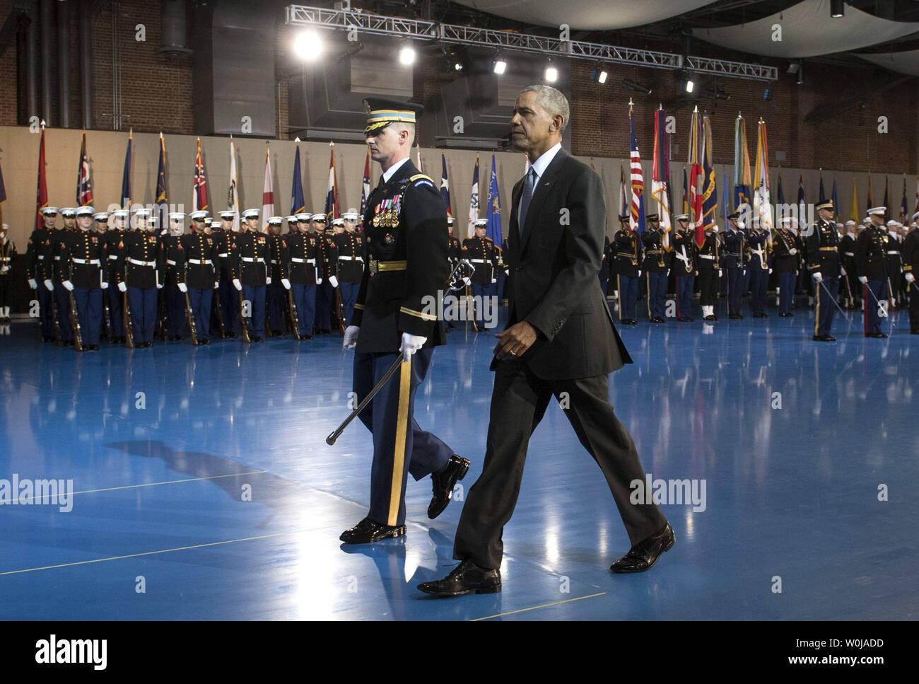 President Barack Obama is escorted by Army Col. Jason T Garkey as he inspects the Armed Forces Honor Guard during his Armed Forces Full Honor Review Farewell Ceremony at Joint Base Myers-Henderson Hall, in Virginia on January 4, 2017. The five braces of the military honored the president and vice-president for their service as they conclude their final term in office. Photo by Kevin Dietsch/UPI Stock Photo
