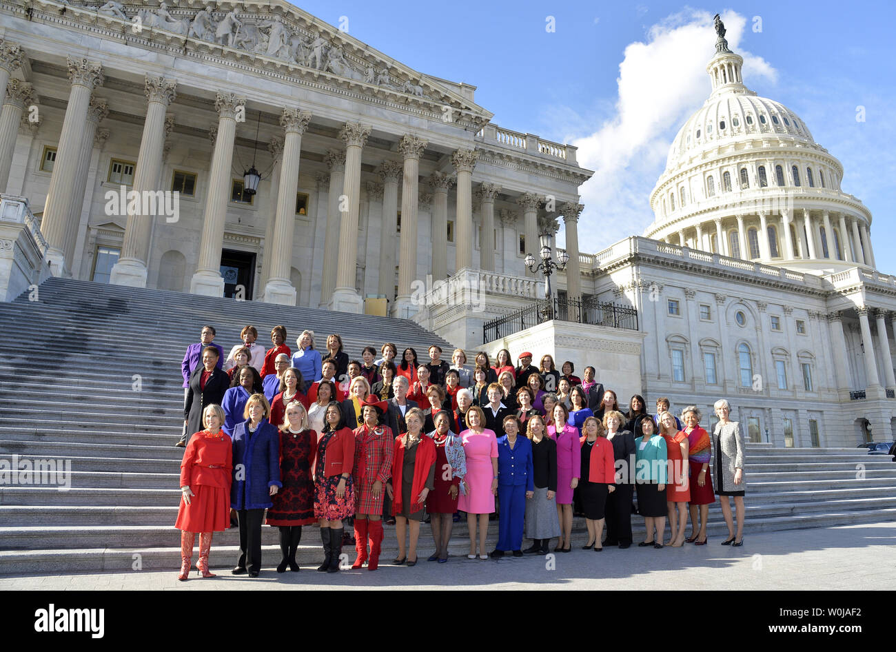 House Democratic Leader Nancy Pelosi (D-CA), (C, front row), joins a group of House Democratic women for a group photo on the steps of the U.S. Capitol, January 4, 2017, in Washington, DC. There are now a historically-high 65 Democratic women in the 115th Congressional House.     Photo by Mike Theiler/UPI Stock Photo