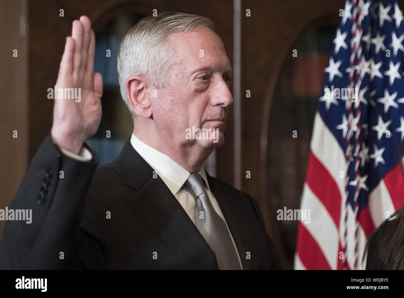 Marine Corps General James Mattis is sworn-in as Defense Secretary by Vice President Mike Pence (not pictures), in the Vice Presidential ceremonial office in the Executive Office Building in Washington, D.C. on January 20, 2017. Photo by Kevin Dietsch/UPI Stock Photo