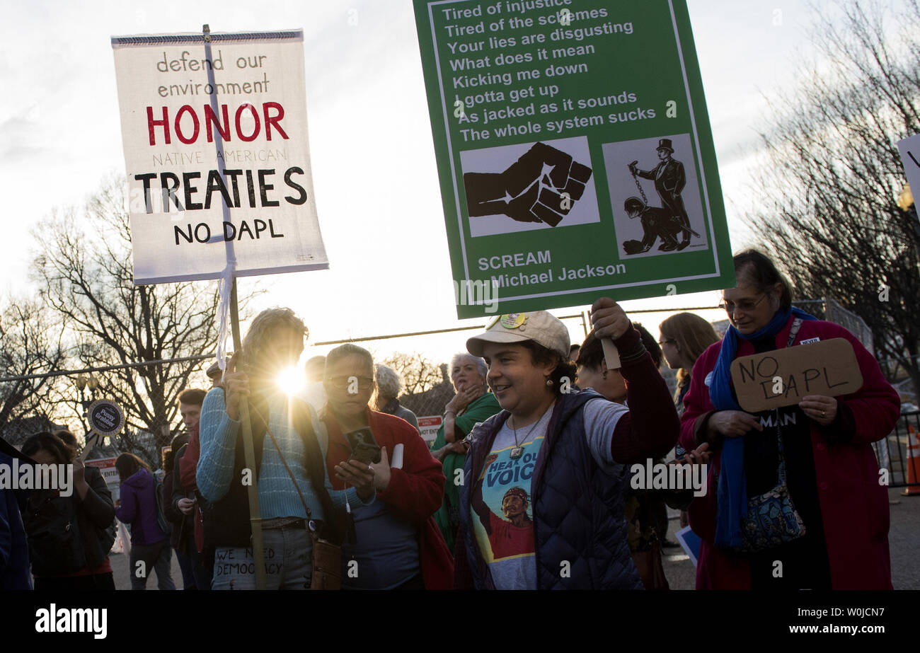 Protesters gather to demonstrate against the Dakota Access Pipeline near the White House in Washington, D.C. on February 8, 2016. The Trump Administration and the Army Corp. of Engineers has allowed the Dakota Access oil pipeline construction to continue through the Sioux Tribe reservation after the Obama administration halted it after heavy pushback. Photo by Kevin Dietsch/UPI Stock Photo