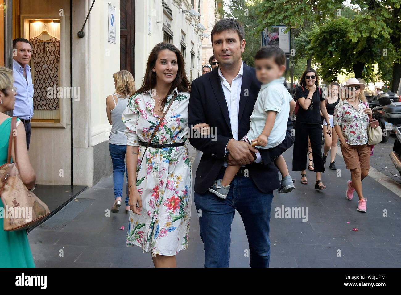 Alessandro Di Battista with his partner Sahra Lahouasnia and his son