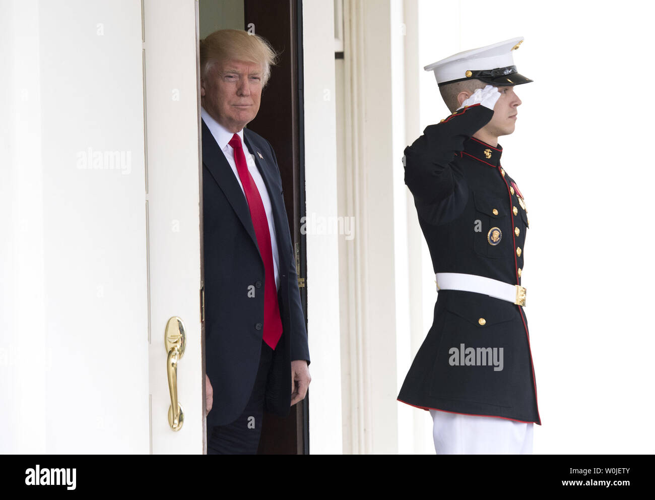 President Donald Trump waits to greet Prime Minister Lars Lokke Rasmussen of Denmark to the White House in Washington, D.C. on March 30, 2017. Photo by Kevin Dietsch/UPI Stock Photo
