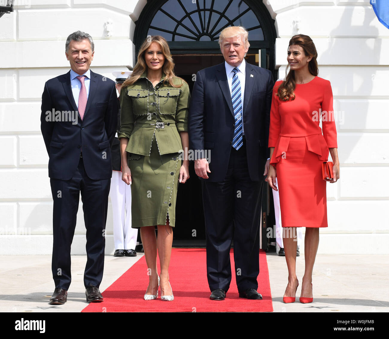 U.S. President Donald Trump and First Lady Melania greet Argentine President Mauricio Macri (L) and his wife Juliana Awada (R) upon arrival at the South Portico of the White House in Washington, DC on April 27, 2017.  Macri is in town for talks with Trump.     Photo by Pat Benic/UPI Stock Photo