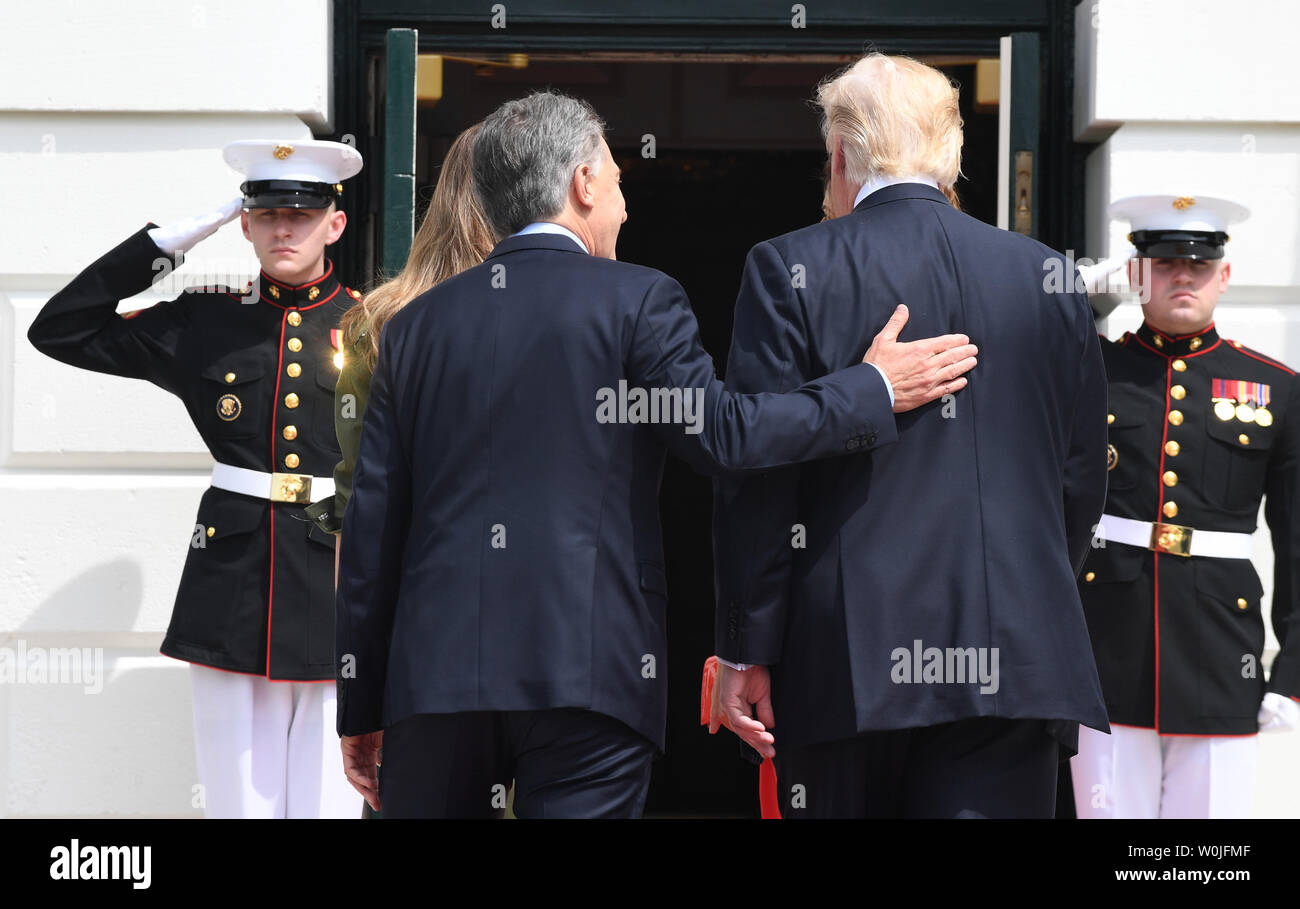 U.S. President Donald Trump and Argentine President Mauricio Macri (L) walk in the White House with their wives First Lady Melania and Juliana Awada upon arrival at the South Portico of the White House in Washington, DC on April 27, 2017.  Macri is in town for talks with Trump.     Photo by Pat Benic/UPI Stock Photo