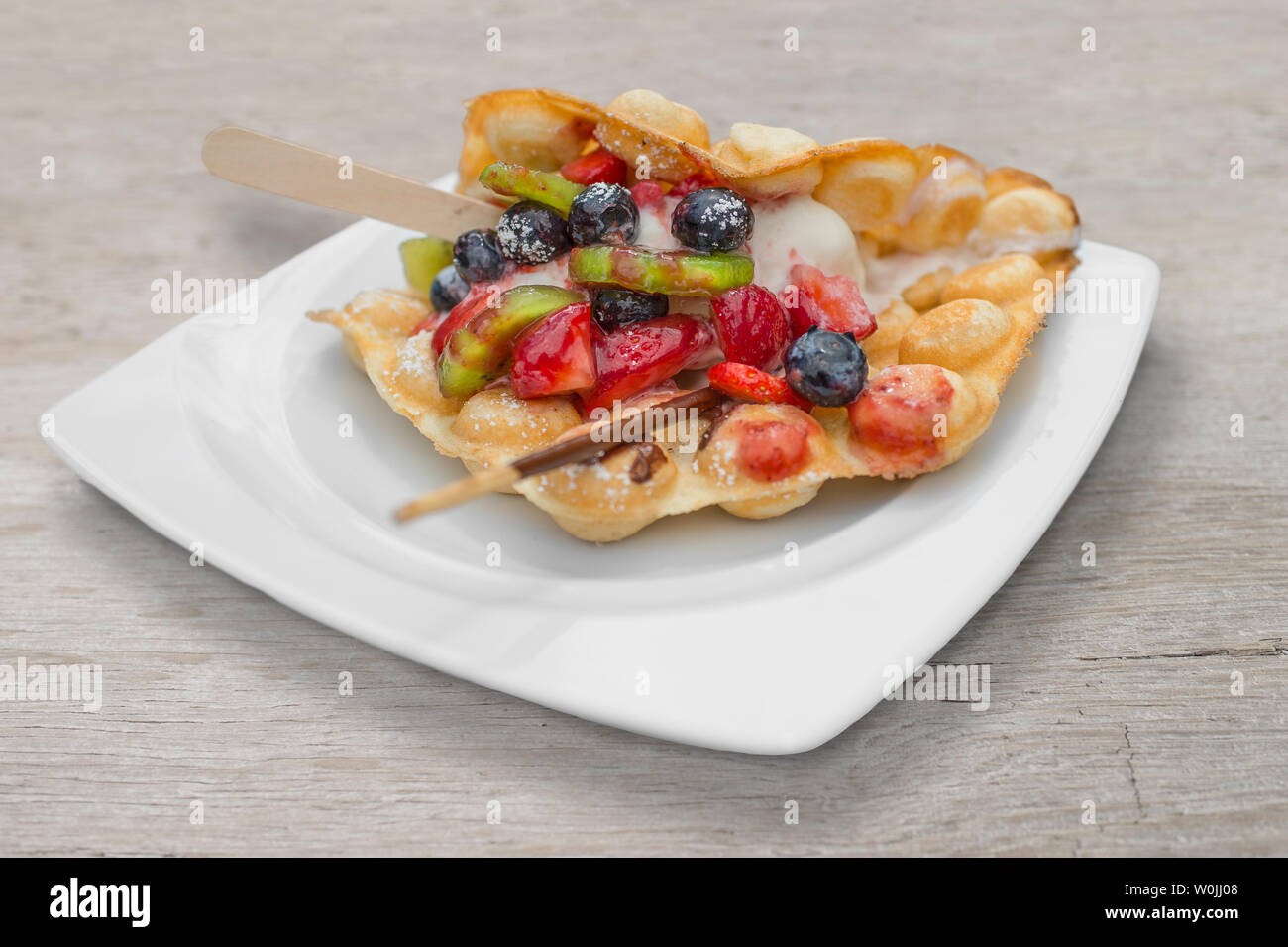Trend pastry Bubble Waffles (Egg Waffles, Hong Kong cakes) with ice