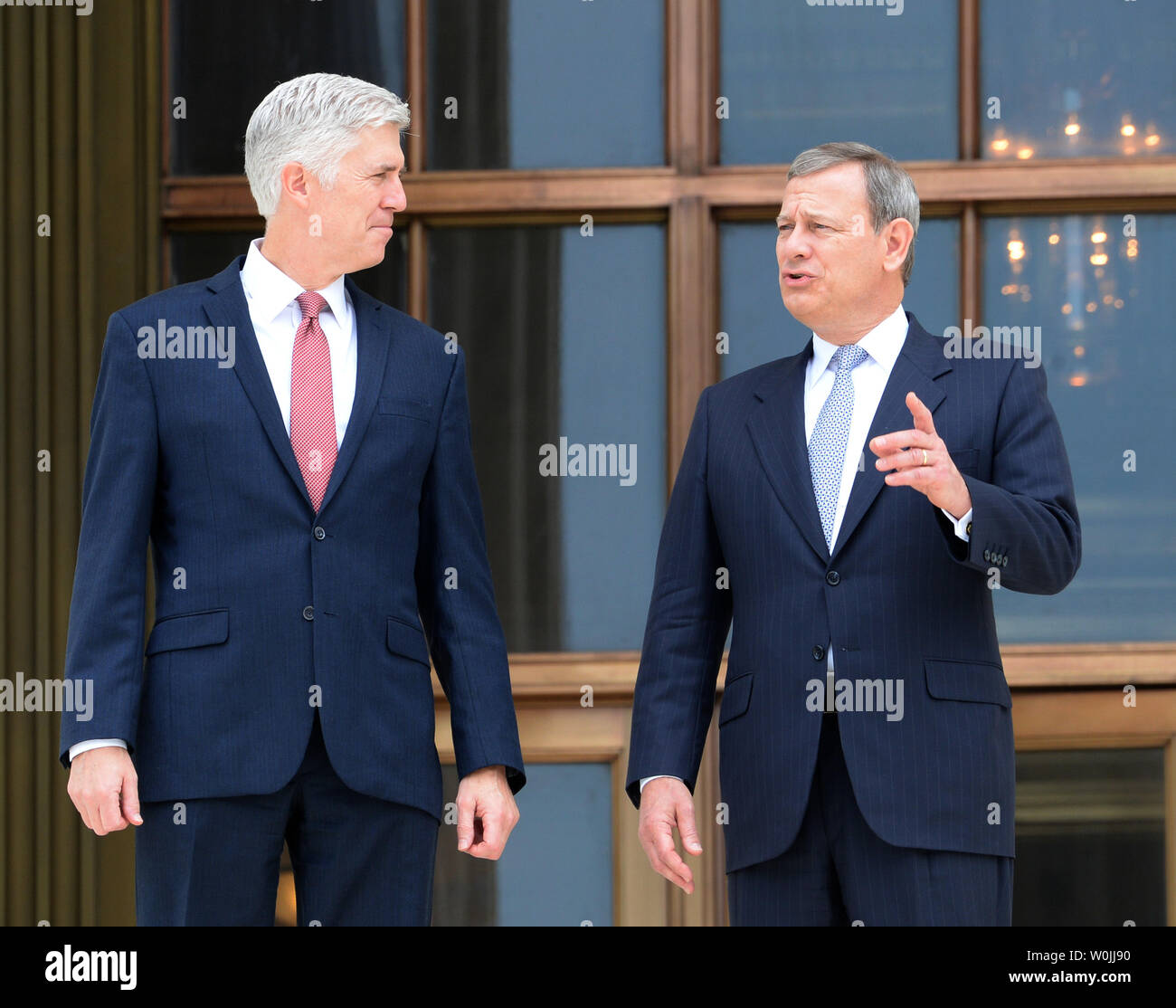 Chief Justice of the United States John Roberts on the Colonnade