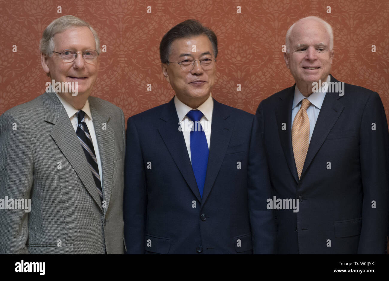 President of South Korea Moon Jae-in poses for a photo with Sen. Mitch McConnell, R-Ky., left and Sen. John McCain, R-AZ, at the U.S. Capitol in Washington, D.C., June 29, 2017.      Photo by Molly Riley/UPI Stock Photo