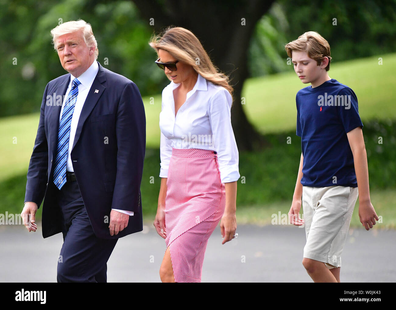 President Donald Trump, First Lady Melania Trump and their son Barron  depart the White House for a weekend trip to Bedminster, New Jersey, on  June 30, 2017 in Washington, D.C. Photo by