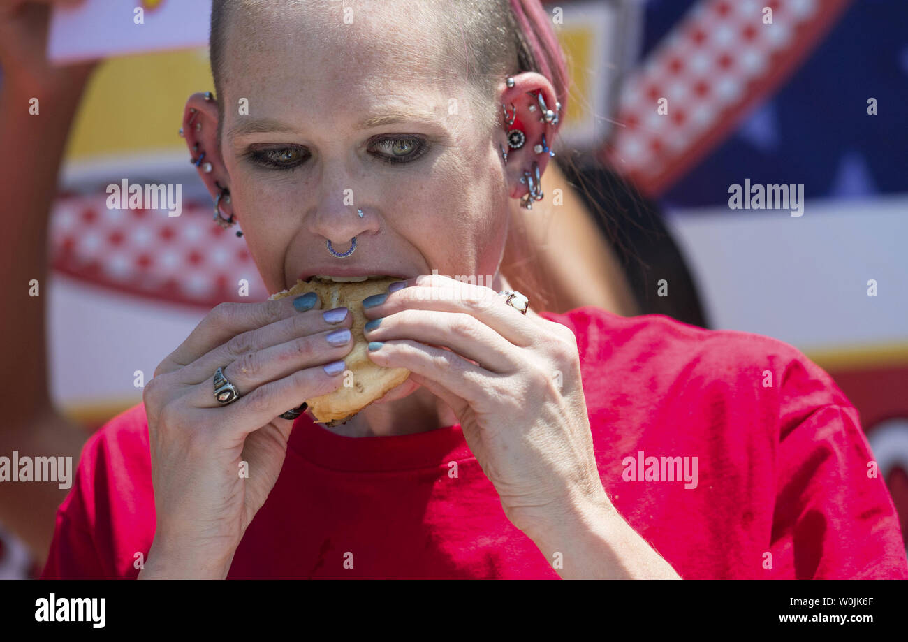 Molly Schuyler competes in the Z-Burger 8th Annual Independence Burger Eating Championship, in Washington D.C. on July 3, 2017. Schuyler won this year's contest eating 21 burgers in 10 minutes. Photo by Kevin Dietsch/UPI Stock Photo