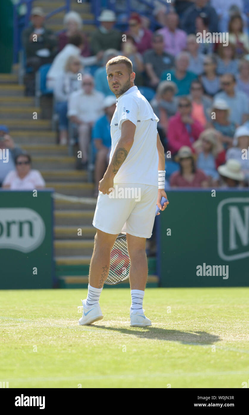 Dan Evans (Gbr) playing on centre court at the Nature Valley International tennis, Devonshire Park, Eastbourne, UK. 27th June 2019. Stock Photo
