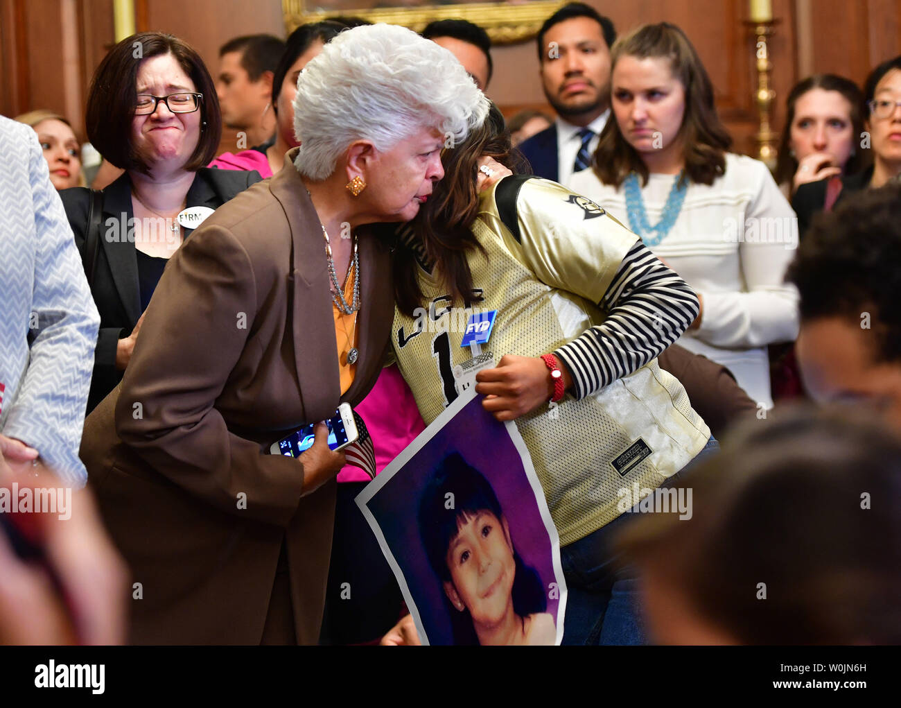 Dep. Grace Napolitano, D-Calif, hugs Karen Caudillo, 21, a DACA recipient, as she attends a Democratic press conference calling on Congressional Republicans to stop the wind down of the Deferred Action for Childhood Arrivals (DACA) initiative at the U.S. Caption in Washington, D.C. on September 6, 2017. Photo by Kevin Dietsch/UPI Stock Photo