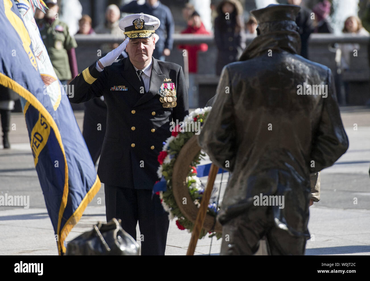 Rear Admiral Charles M. Rock, Commander of the Naval District of Washington, salutes during a