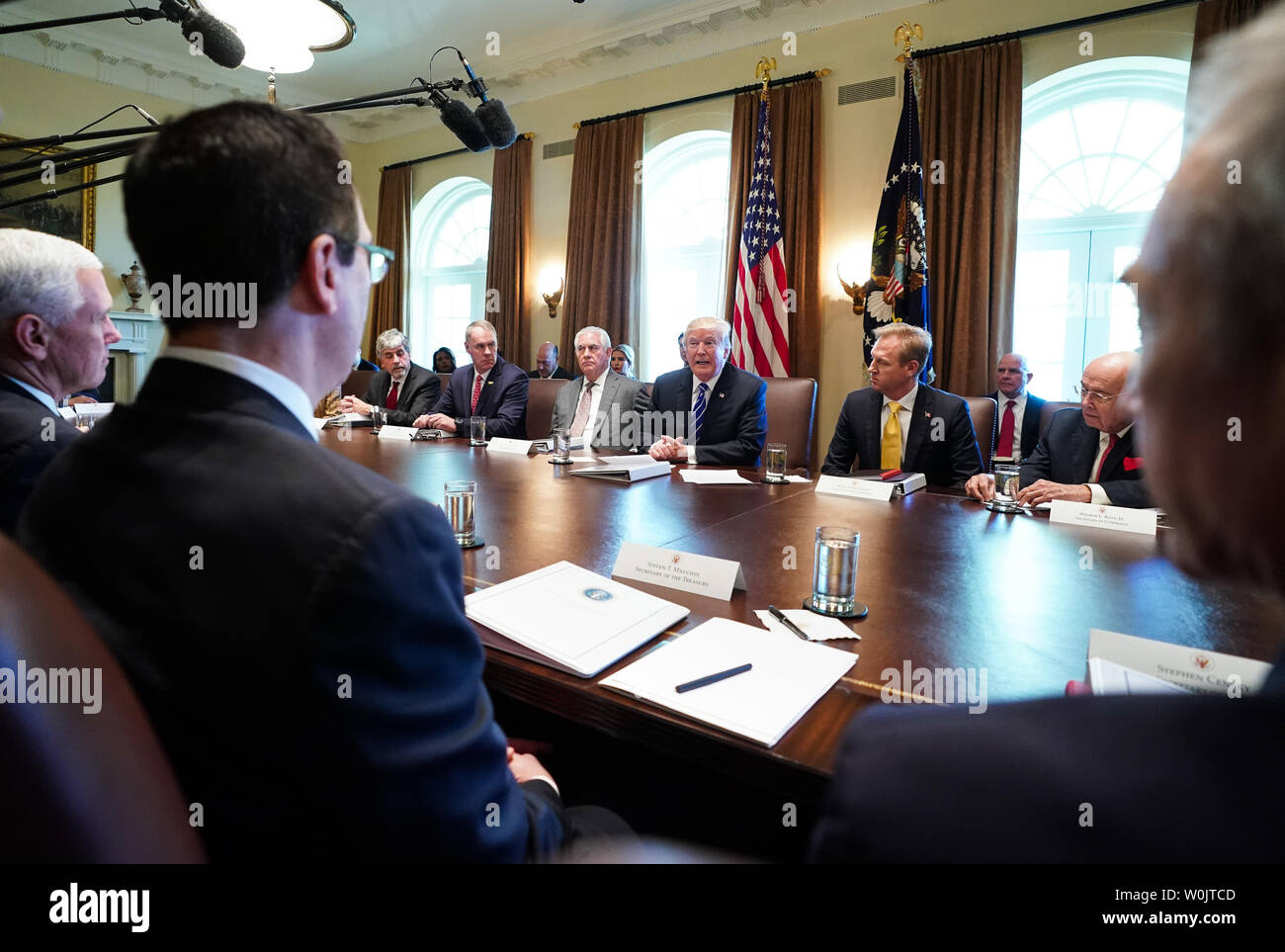 President Donald Trump speaks to the media during a cabinet meeting at ...