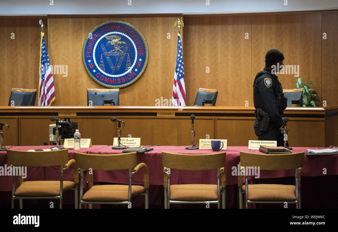 Department of Homeland Security Police search the hearing room where the  FCC is taking up the issue of net-neutrality after the room was cleared mid  hearing for unnamed security reasons, at the