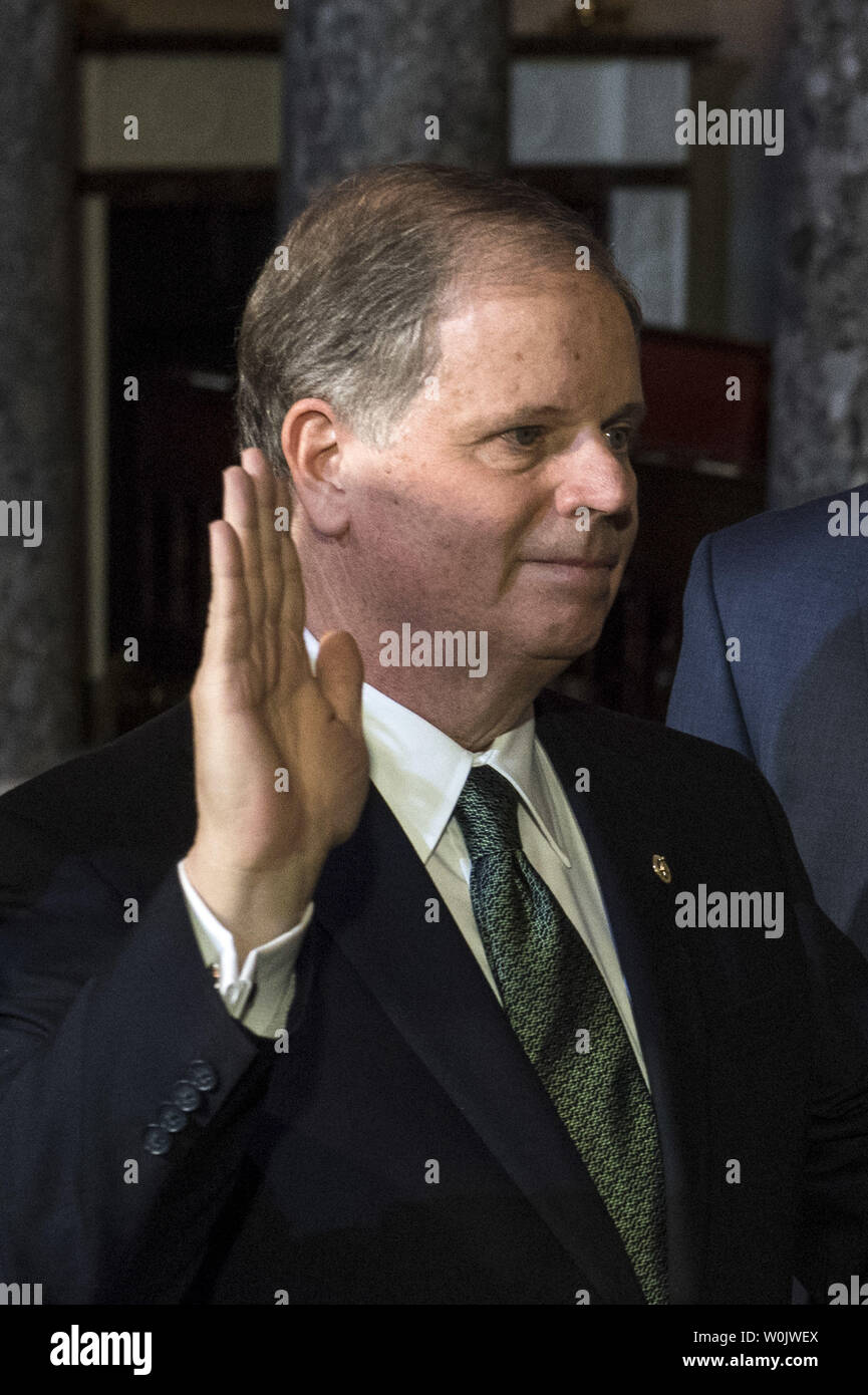 Newly elected Senator Doug Jones, D-AL, reenacts his swearing, on Capitol Hill in Washington, D.C. on January 3, 2018. Photo by Kevin Dietsch/UPI Stock Photo