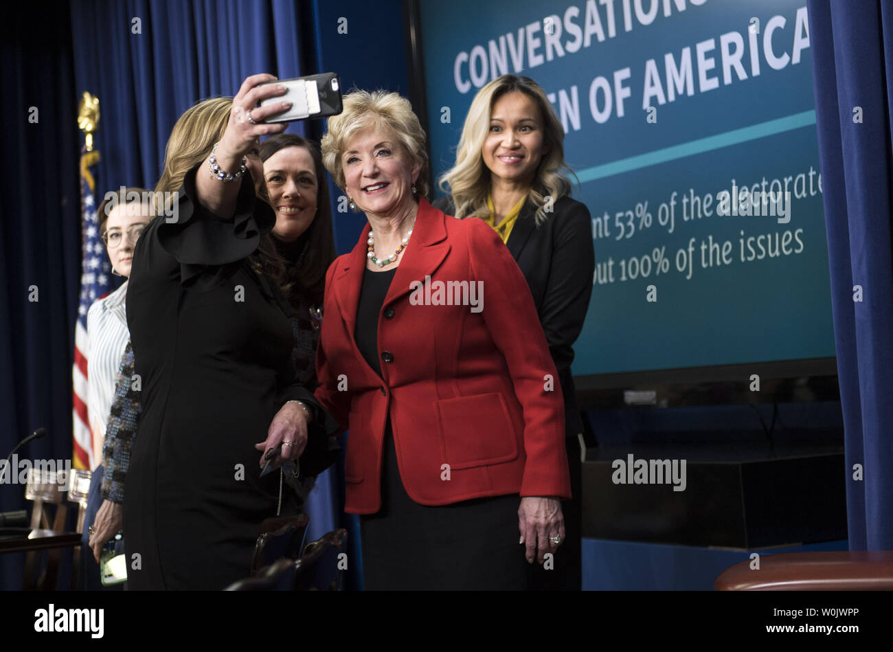 Small Business Administrator Linda McMahon poses with audience members following a panel titled Conversations with the Women of America, on the Trump Administration's efforts to improve the lives or women at home and in the workplace, in the Eisenhower Executive Office Building in Washington, D.C. on January 16, 2017. The multipart panel allowed panel participants to ask questions to members of the Administration on the economy, healthcare, combatting the opioid crisis and national security. Photo by Kevin Dietsch/UPI Stock Photo