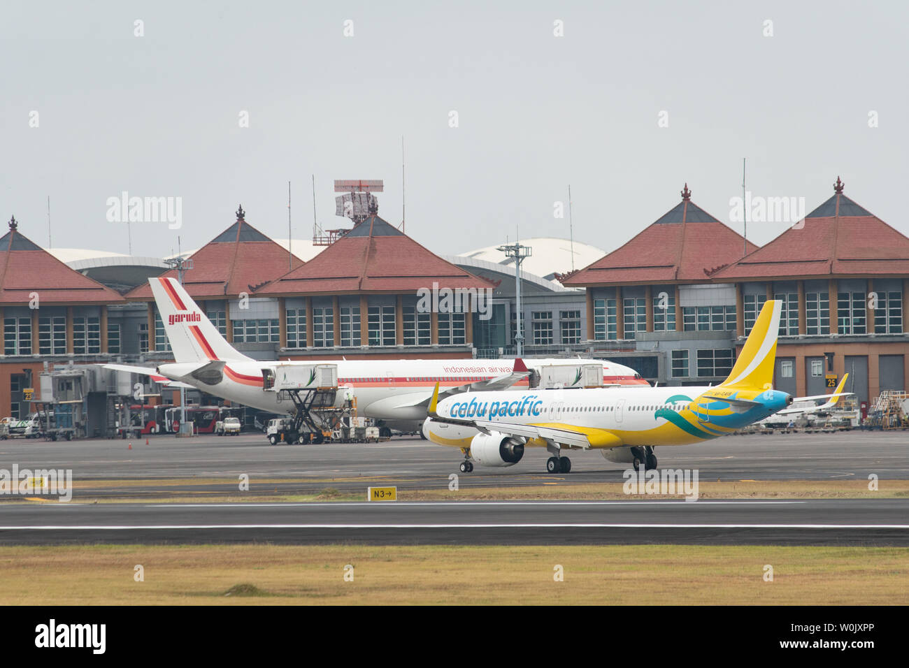 DENPASAR,BALI/INDONESIA-JUNE 08 2019: Some activity of Cebu Pacific airline on Ngurah Rai International Airport Bali. They prepares for to taking off Stock Photo