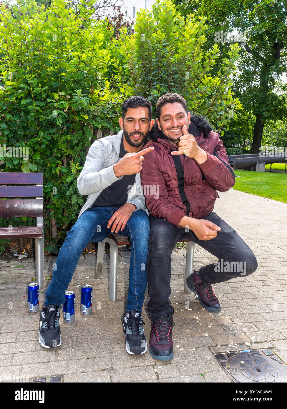 Young men bonding - Saint-Gilles, Brussels, Belgium. Stock Photo