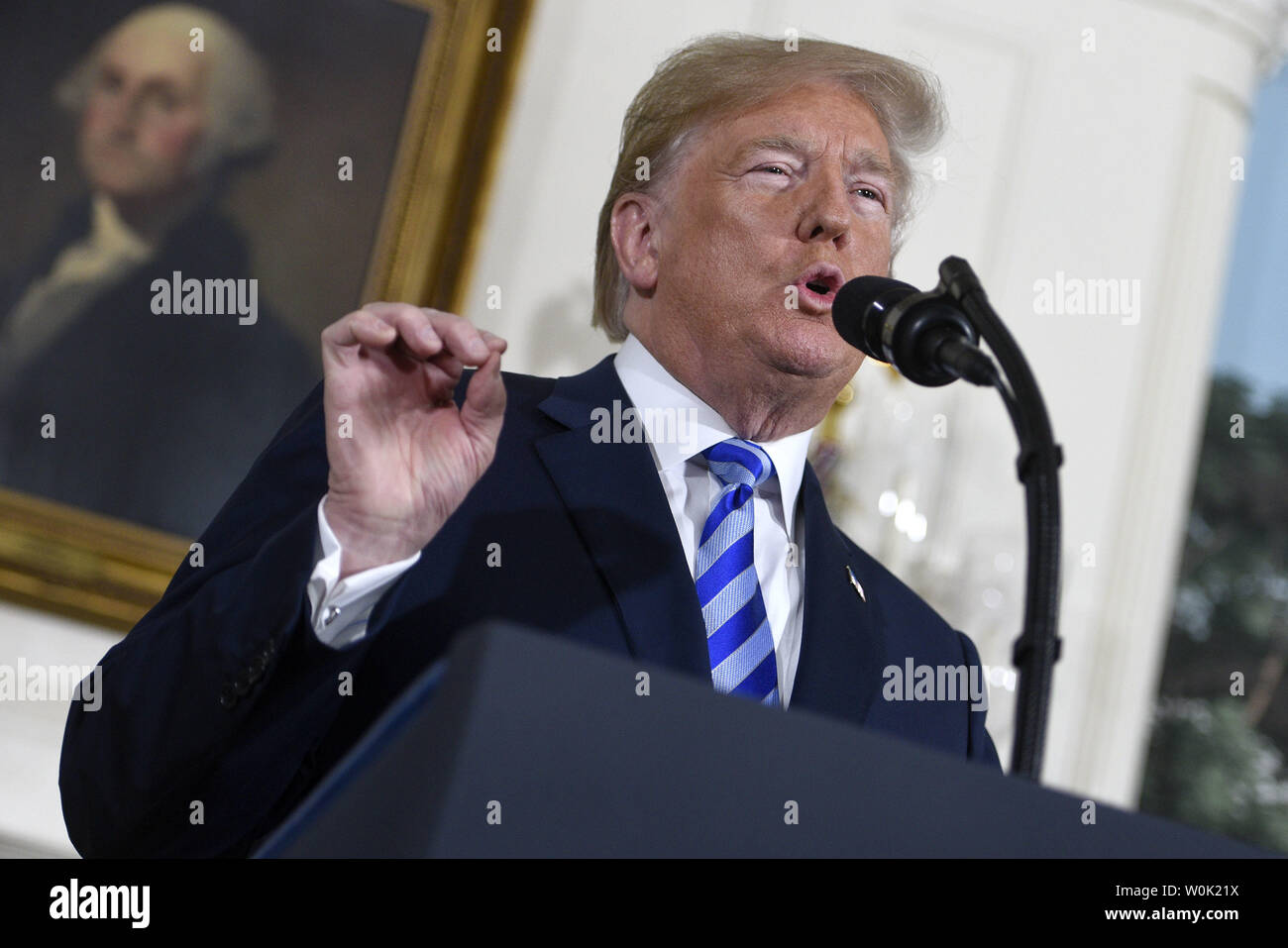 President Donald Trump announces his decision to end the United States participation in the Joint Comprehensive Plan of Action (JCPOA) with Iran and his plans re-impose sanctions lifted under the deal at the White House in Washington, D.C on May 8, 2018. Photo by Leigh Vogel/UPI Stock Photo