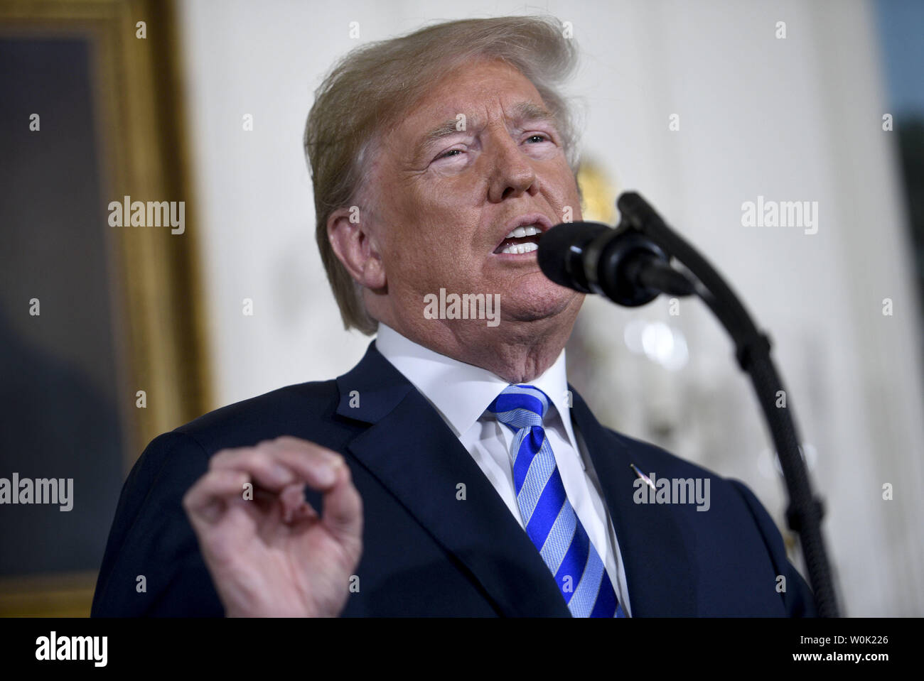 President Donald Trump announces his decision to end the United States participation in the Joint Comprehensive Plan of Action (JCPOA) with Iran and his plans re-impose sanctions lifted under the deal in the Diplomatic Room of White House in Washington, D.C on May 8, 2018. Photo by Leigh Vogel/UPI Stock Photo